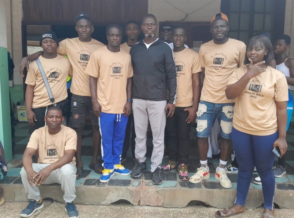 Boxing champs and MPs join street academy’s 25th anniversary walk