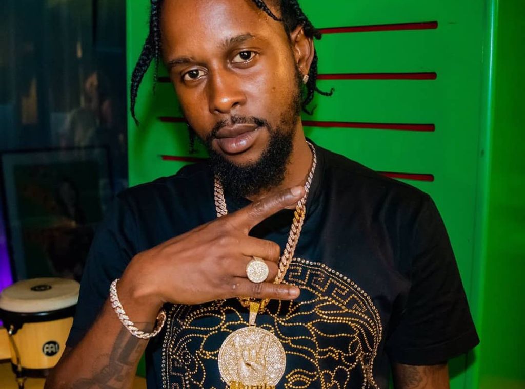 Popcaan denies being booked for any performance in Ghana this December