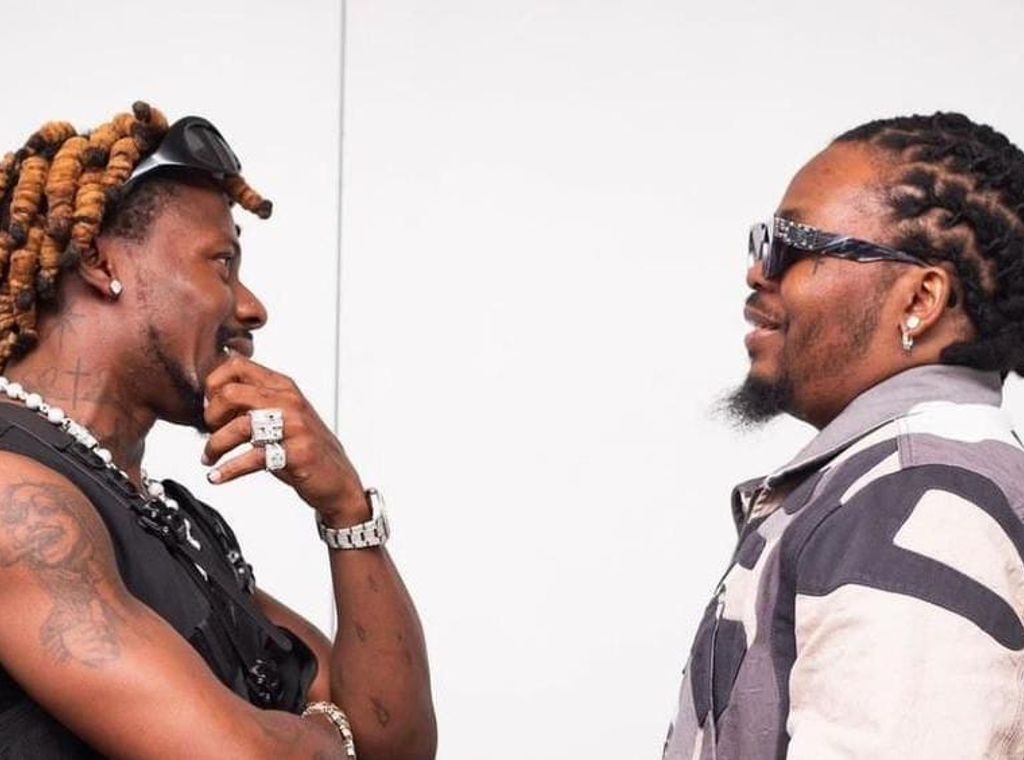 Olamide finally breaks silence on rumoured feud with Asake: 'we are still family