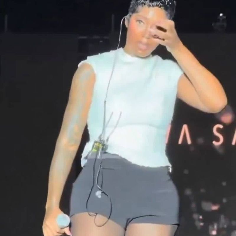 Tiwa Savage cries on stage during the WeLoveYa festival performance in Benin